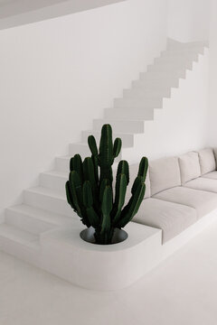 Refined minimalist staircase links the living room to the upper level