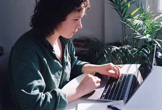 Young Woman Working on Laptop 