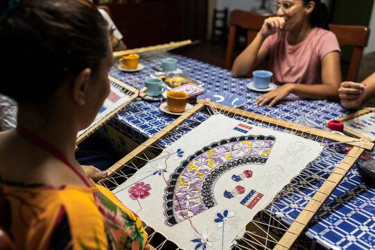 Community artisans making lace together