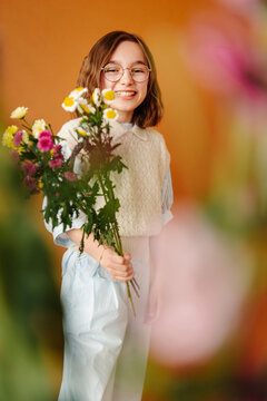 Elegant teen portrait with floral theme
