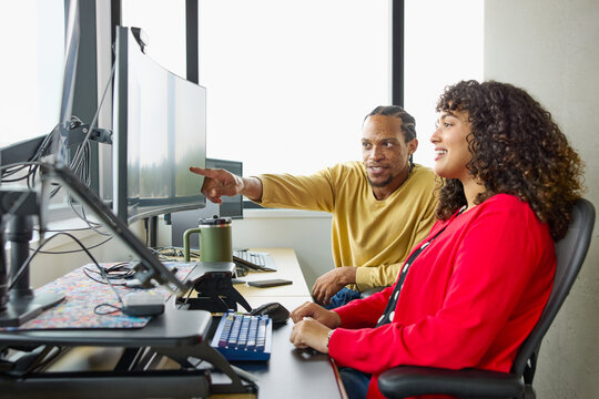 Team Members Working Together in Office