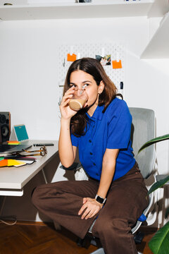 Enjoying Coffee in Home Office