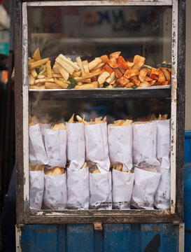 Food Stall Offers Fries and Snacks on Busy Colombo Market Street 