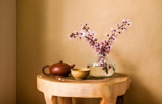 Still life with traditional Chinese tea cup and clay teapot.
