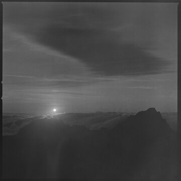 Sunrise above clouds mountain silhouette Madeira