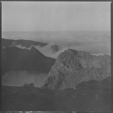 Mountain ridge above clouds Madeira black and white