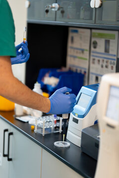 Scientist runs lab experiment