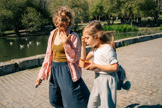 Walking Together at the Park During a Sunny Day in Spring