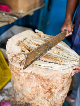 Dried Fish Being Cut at Shop in Pettah Market, Colombo