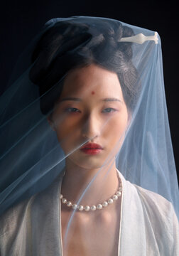 A portrait of a woman dressed in traditional Chinese Hanfu 
