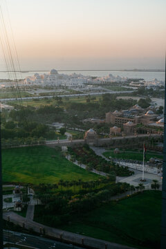 Sheikh Zayed Grand Mosque and gardens at sunset in Abu Dhabi