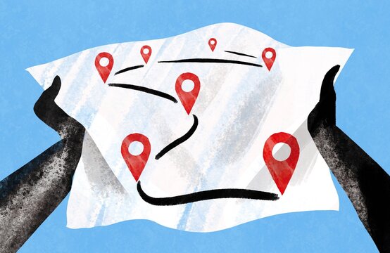 Hands holding Route Map with Location Pins &ndash; Journey and Goal Concept