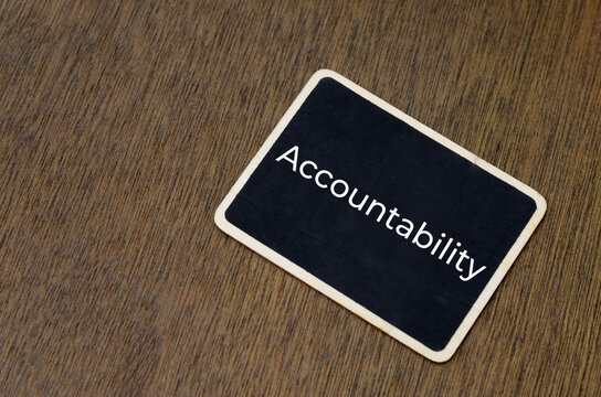 Accountability Concept Written on Small Chalkboard Sign