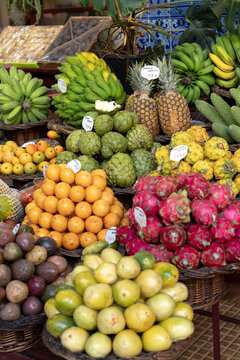 Colorful tropical fruits display at local market on Madeira