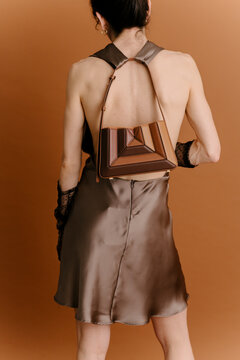Brown Leather Shoulder Bag On Bare Back
