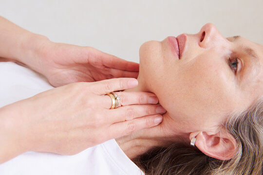Woman focusing on neck sensation
