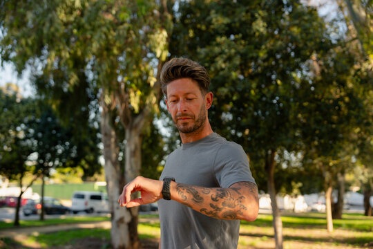Man Checking Smartwatch During Workout