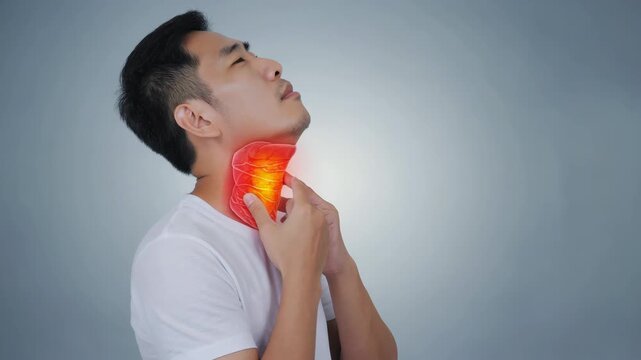 Young asian man touching his throat and feeling strong pain. person suffering from painful swallowing, angina, loss of voice