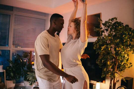 Couple dancing at home