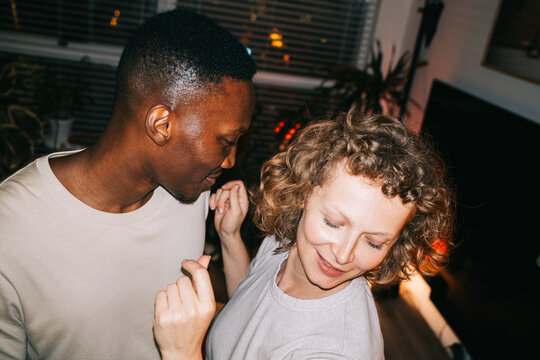 Couple dancing at home