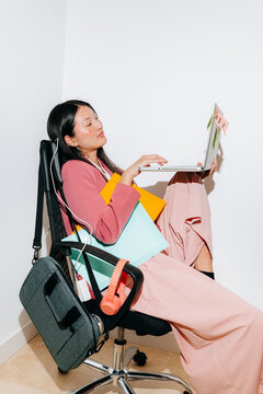 Asian Woman Working on Laptop With Sticky Notes With White Background