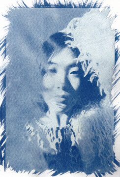 Womanwith cyanotype processing