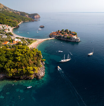 Sveti Stefan island in summer, aerial panorama