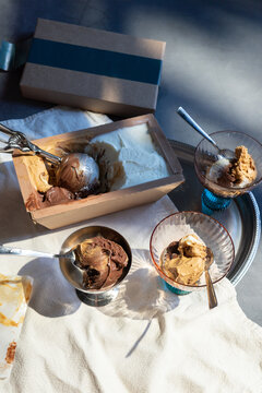 Artisanal Ice Cream Served in Bowls with Scoop and Box