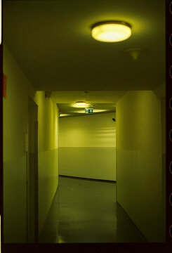 Empty corridor with exit sign