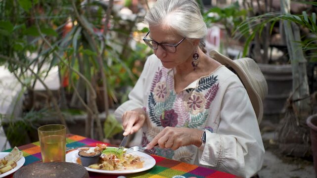 Mature woman travels to Mulege and enjoys local food while taking in sights in Baja California Sur near the Sea of Cortez.