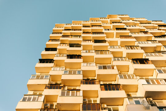 High-rise Building With Balconies Under Clear Sky in City