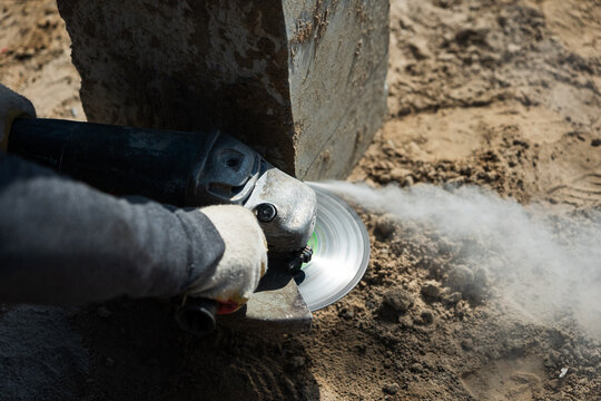 Cutting concrete pile with grinder