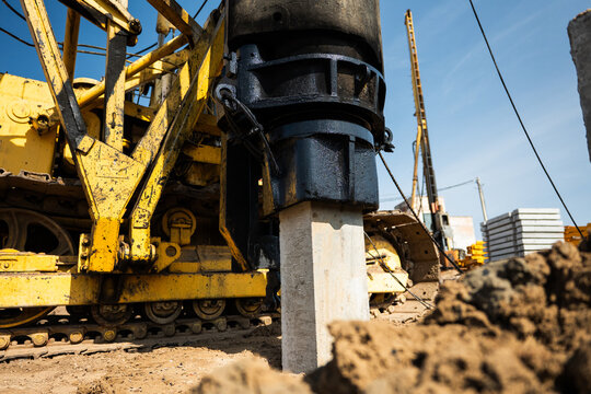 Pile driving machine at site