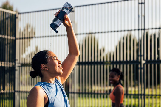 Refreshing moment on a sunny outdoor workout