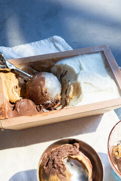 Artisanal Ice Cream Box with Mixed Flavors and Scoop