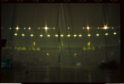 Stage seen through sheer curtain