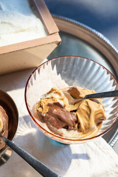 Close-Up of Chocolate and Caramel Ice Cream in Glass Bowl