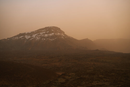 Volcanic Rock Desert Landscape With Rugged Sand Dunes 