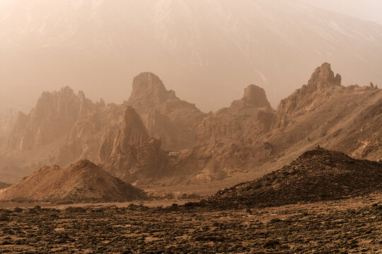 Volcanic Rock Desert Landscape With Rugged Sand Dunes 