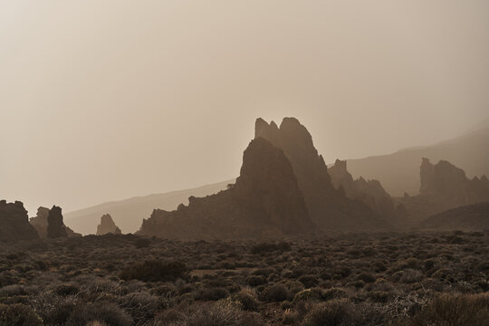 Volcanic Rock Desert Landscape With Rugged Sand Dunes 