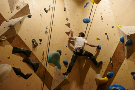 Man Rock Climbing