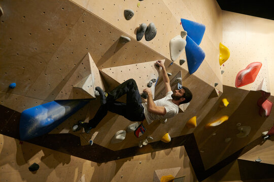 Man Rock Climbing
