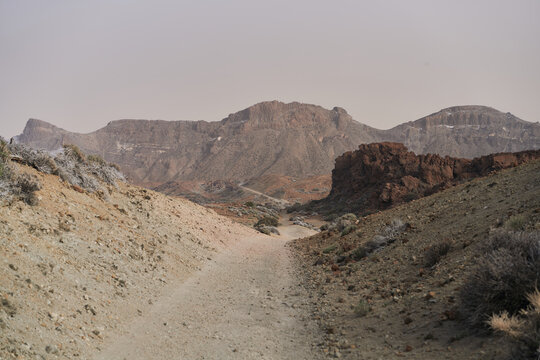 Volcanic Rock Desert Landscape With Rugged Sand Dunes 