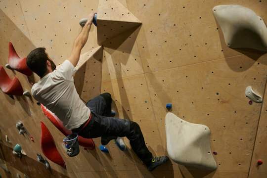 Man Rock Climbing