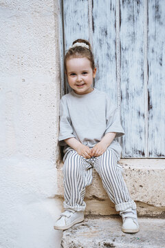 Little girl on vacation in Italy, Ostuni.