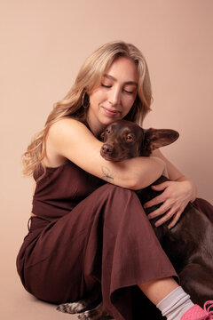 Woman Hugging Dog