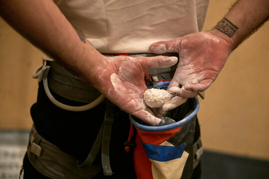 Detail of hands of a Man Rock Climbing