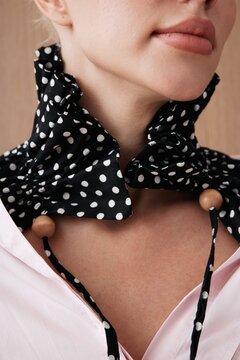 Woman in scarf fashion detail