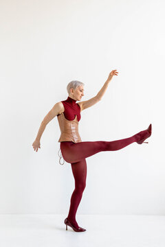 A woman dancing in a studio