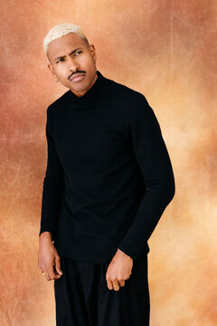 Black man with blonde hair l